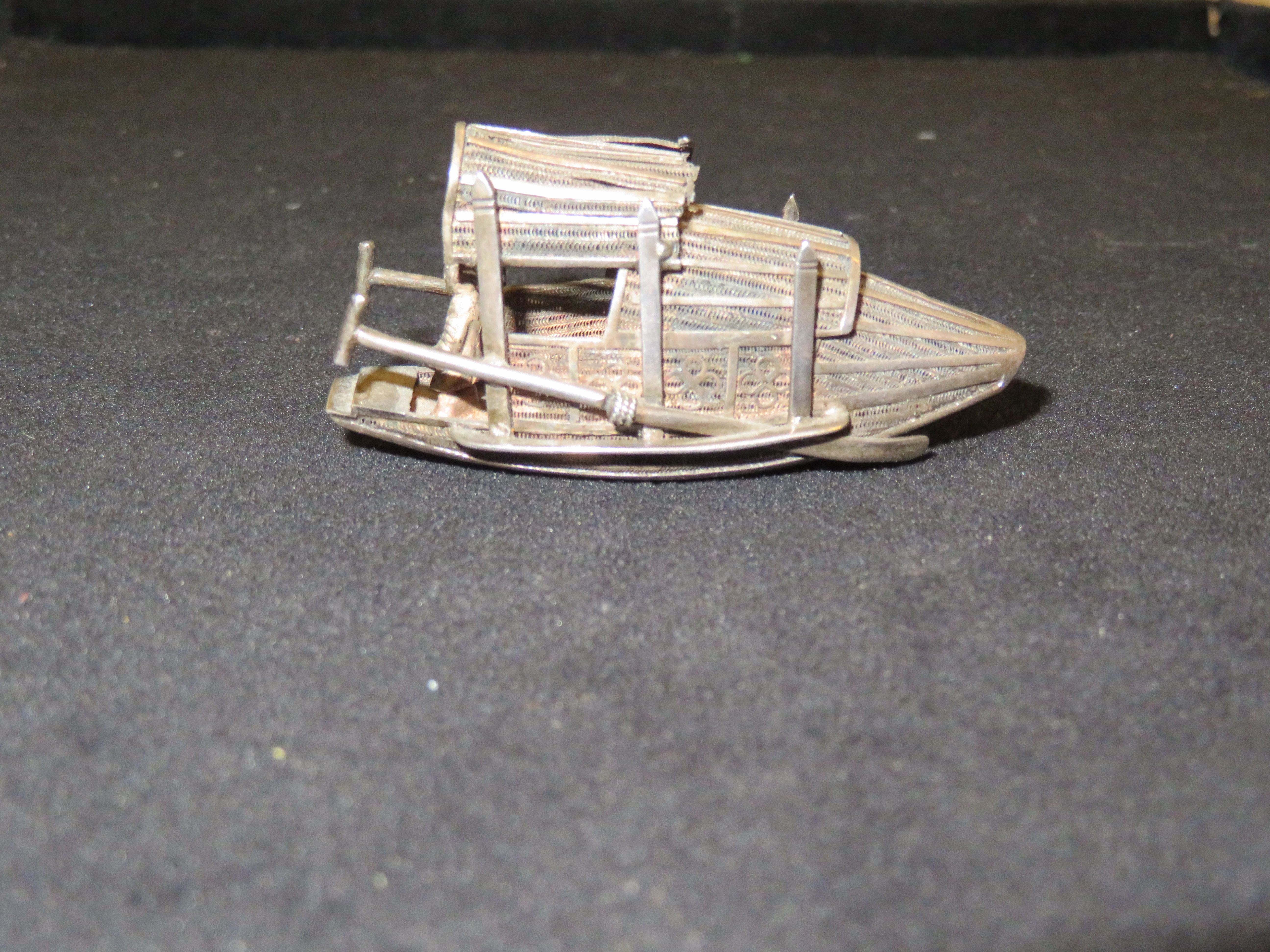 Oriental silver junk boat