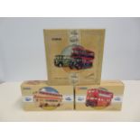 4 Boxed corgi buses, unused with coa's