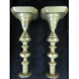 Pair of Victorian brass candle sticks with pushers