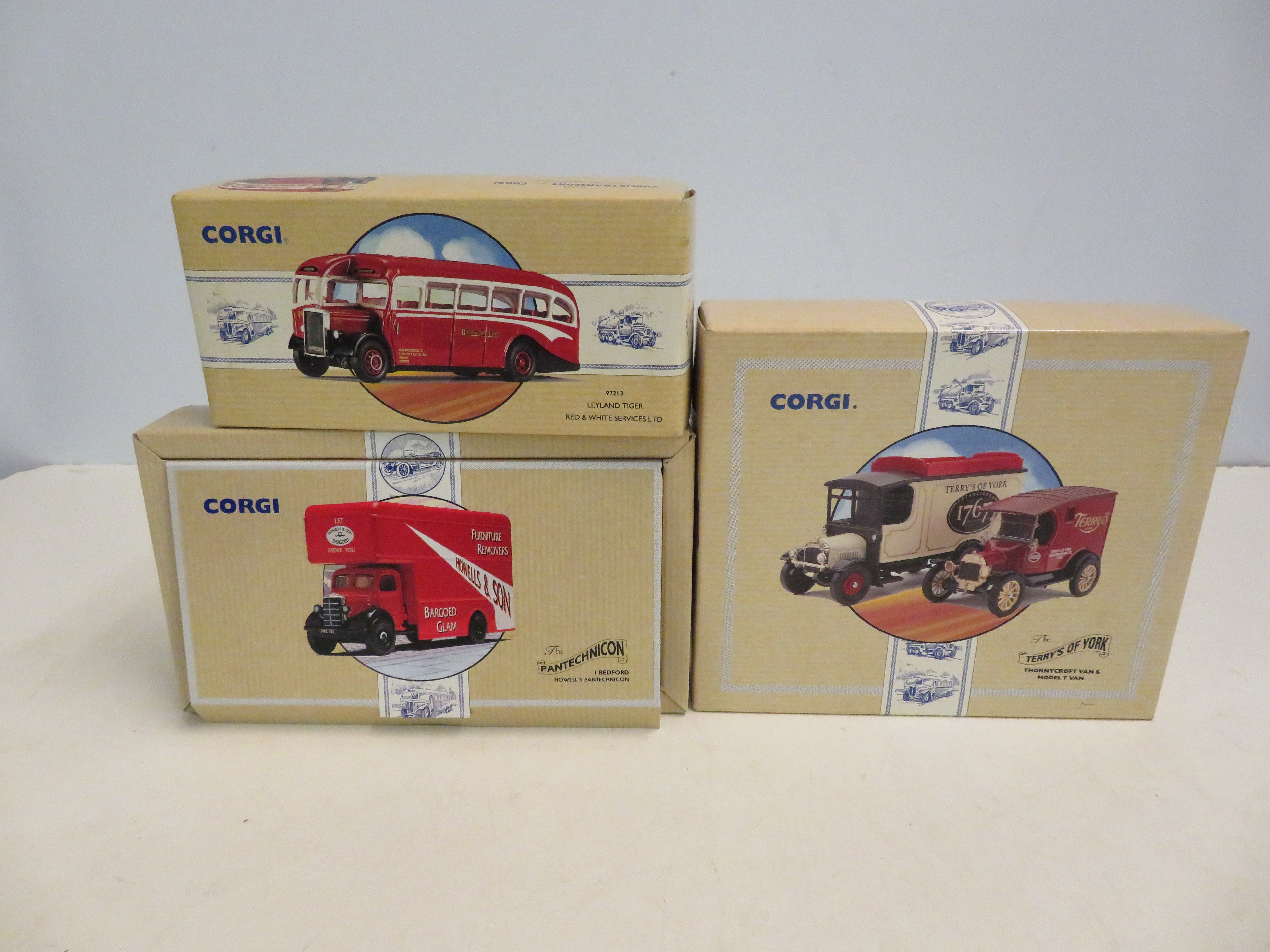 4 Boxed corgi vehicles, unused with coa's