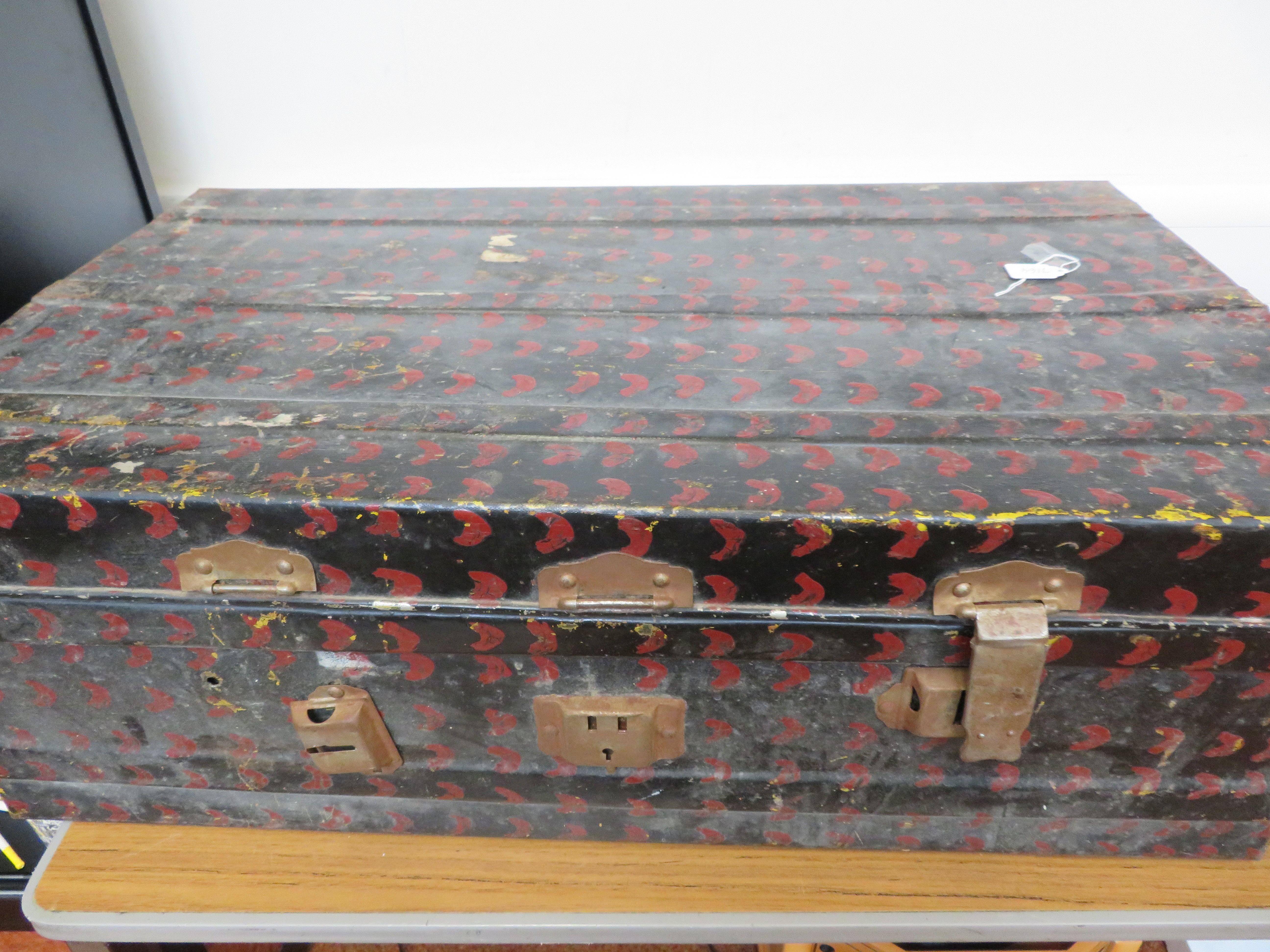 Large metal travel trunk