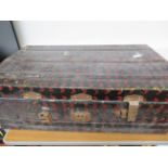 Large metal travel trunk