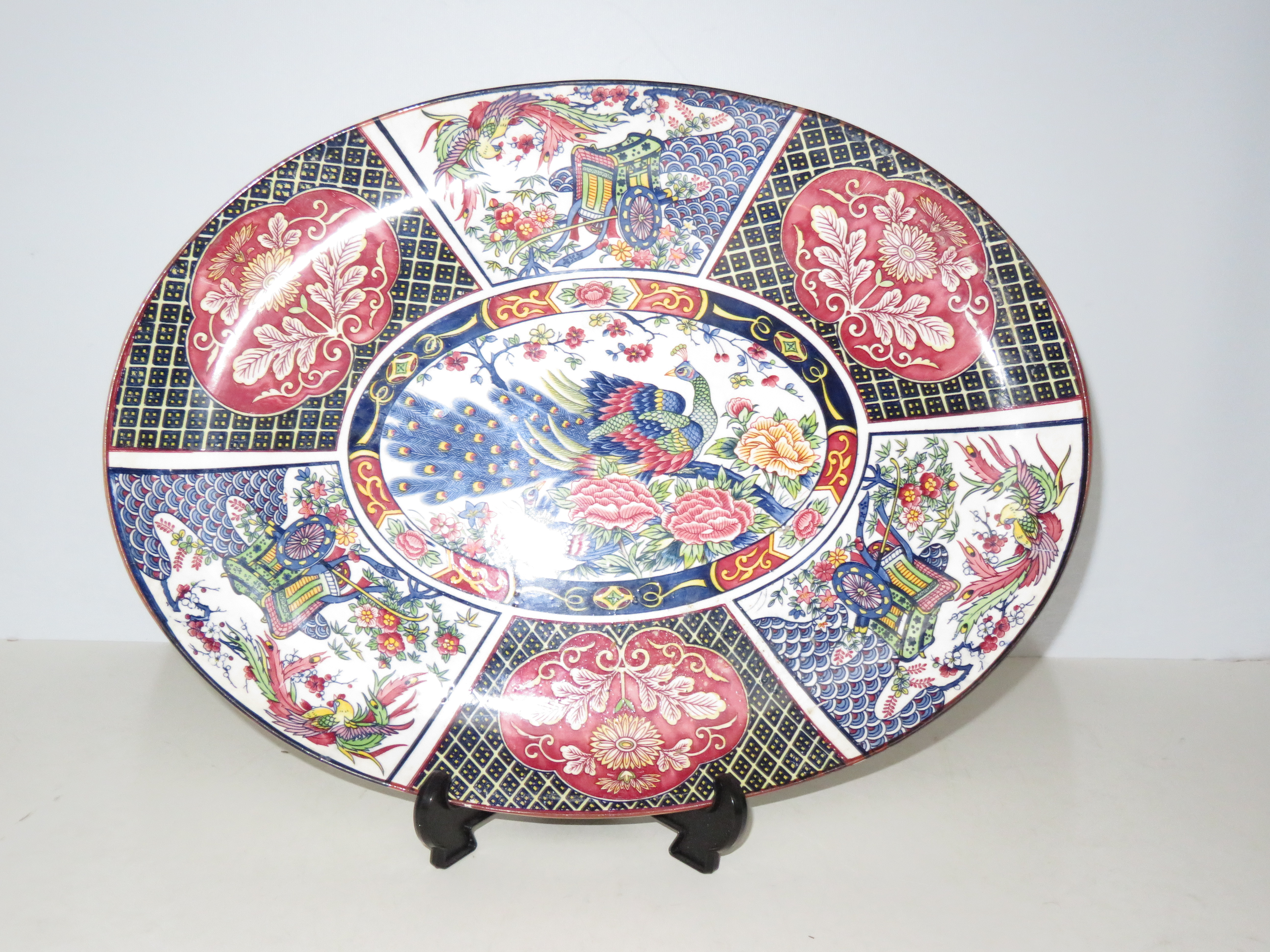 Early 20th century meat plate with peacock decorat