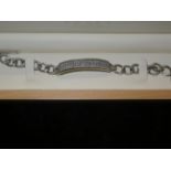 Silver bracelet set with stones