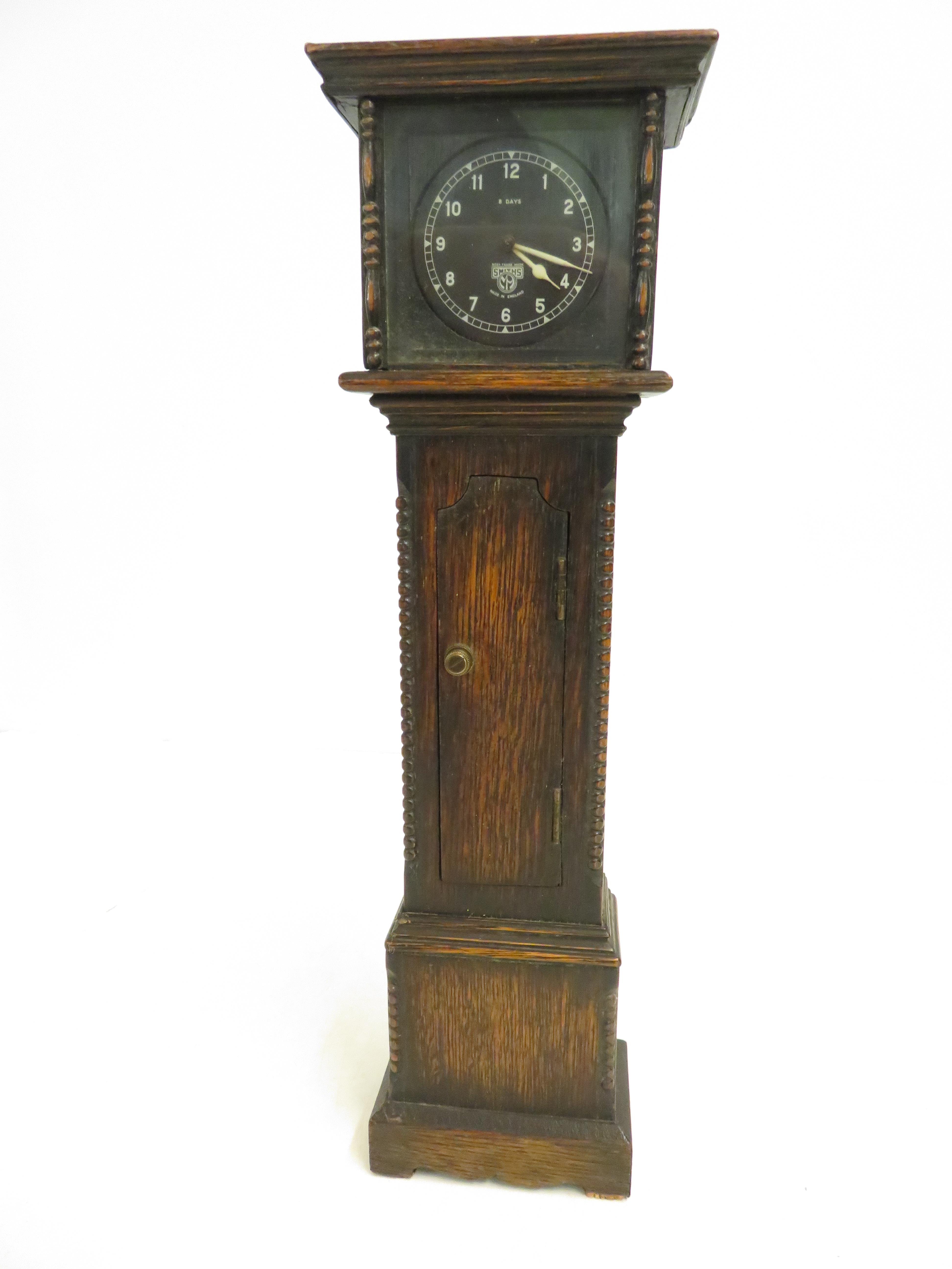 Smiths miniature oak longcase clock with wind up m