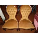 Pair of buttoned back nursing chairs