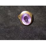 9ct Gold ring set with large amethyst Size O Stone