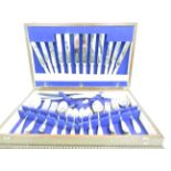 Oak cased set of cutlery