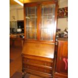 Early 20th century bureau bookcase with leaded lig