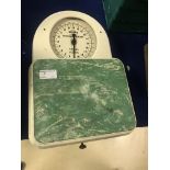 A set of vintage industrial hospital scales
