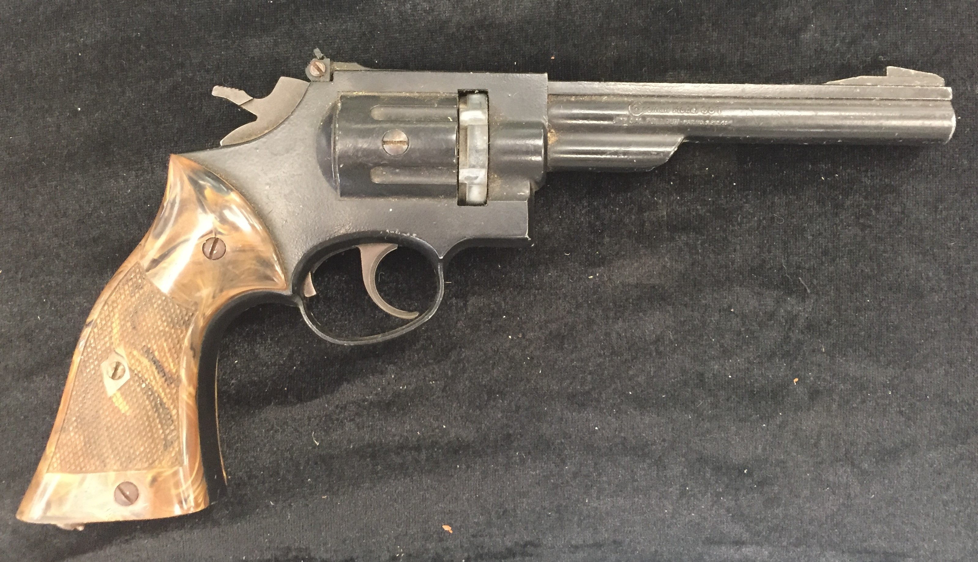 WITHDRAWN A vintage Crossman gas operated revolver air pistol