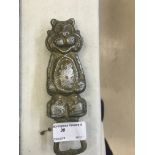 A 1950 Esso "Tiger in Your Tank" bottle opener