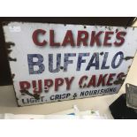 An original 'Clark's Buffalo Puppy Cakes' enamel sign