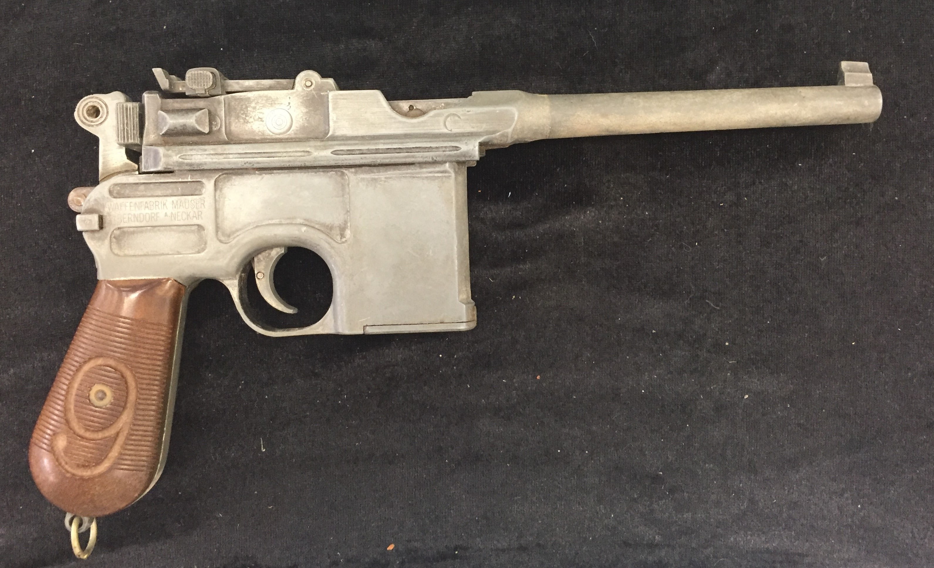 A replica medal moving parts WWI WAffenfabrik Mauser German