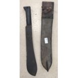 A WWII original British jungle machete in leather scabbard