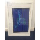 A framed John Lennon/The Beatles poster,