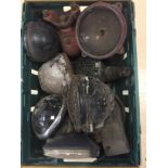 A box of vintage car headlights