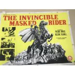 A large original film poster: "The Invisible Masked Rider"