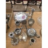 A box of silver plate to inc candlesticks etc