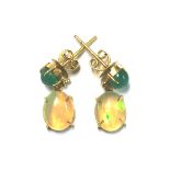 14K Diopside and Opal Earrings: Cabochon cut diopside in claw setting on post fixing suspending an