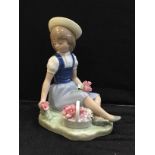 A Lladro figure 'Girl with Wild Flowers',