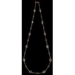 A 14K Pendaloque Cut Aquamarine and Sapphire Necklace: Set in 14k gold, approx 1.