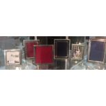 Six HM silver photograph frames