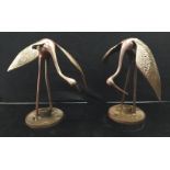 A pair of antique brass Chinese crane statues