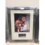 A framed & glazed signed photograph of Sylvester Stallone with COA