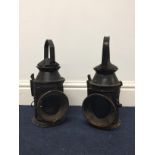 A pair of railway lanterns