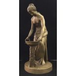 A bronze figure of a lady