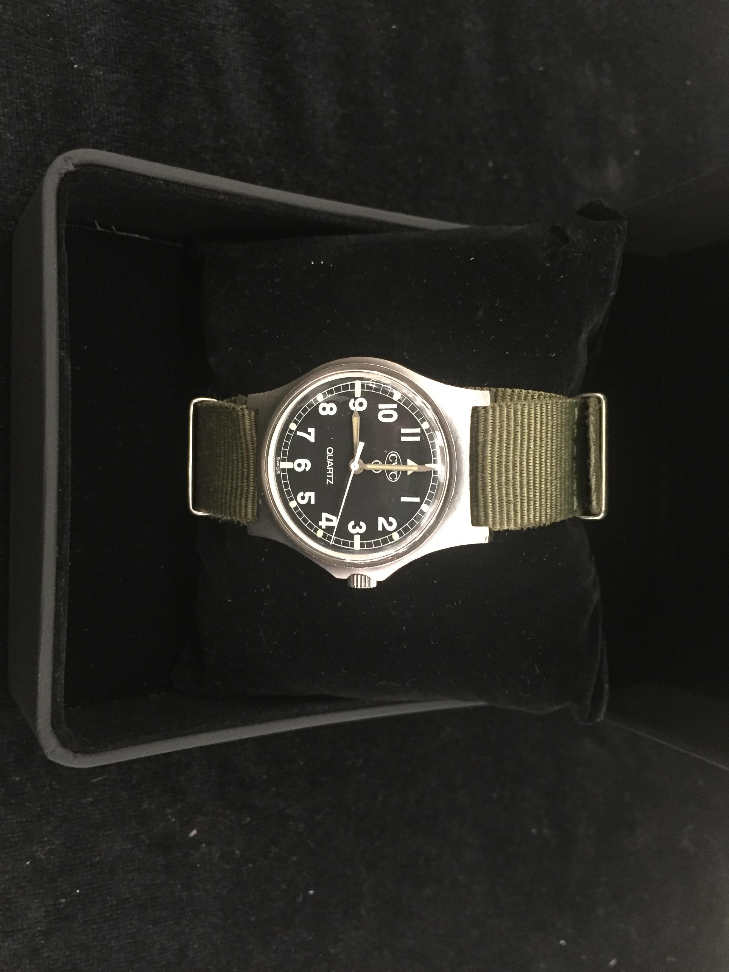 A boxed CWC Nato issued watch