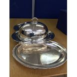 Four large silver-plated oval trays;