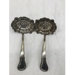 A pair of 19th century silver Dutch straining spoons