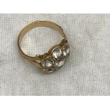 An Indian gold white stone dress ring