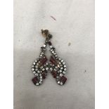 A pair of Indian white and red stone earrings