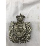 A helmet badge