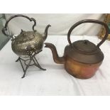 A silver-plated spirit kettle;