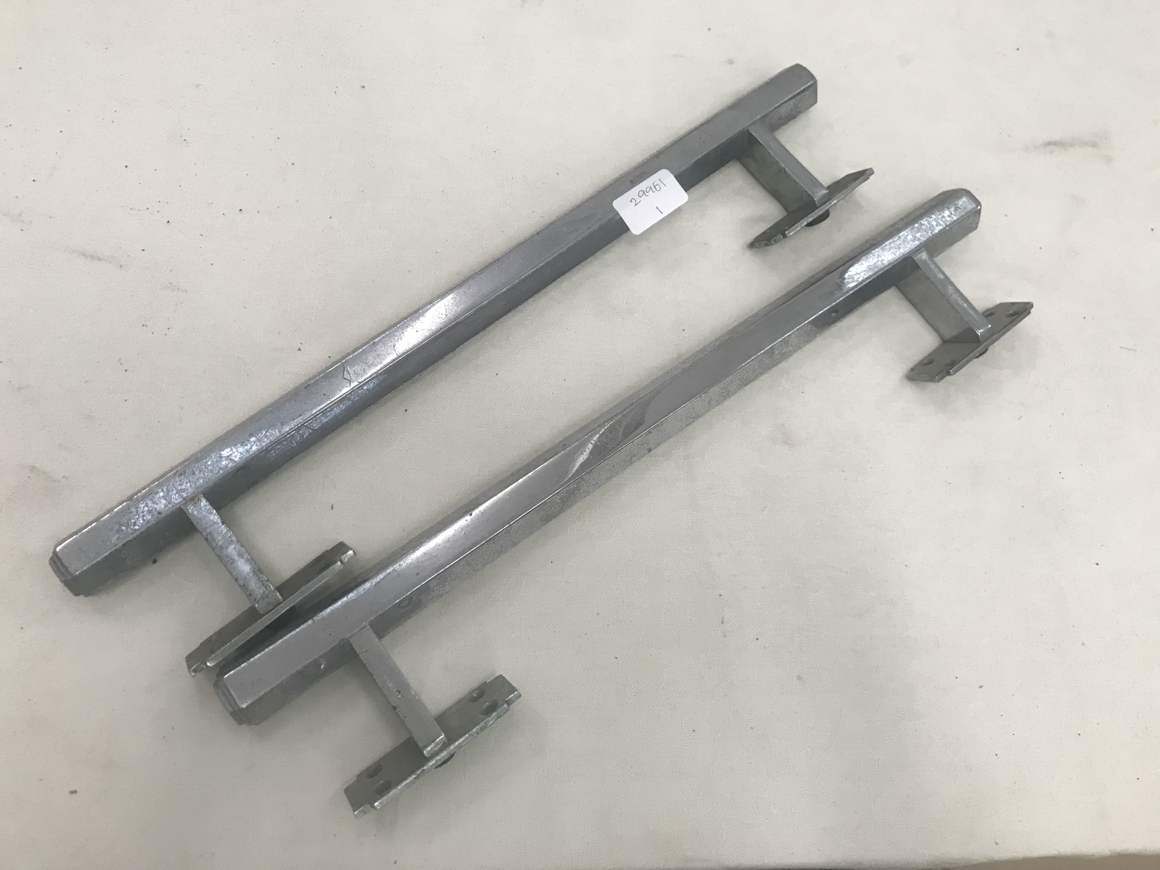 A pair of chrome Art Deco door handles