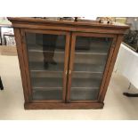 An Edwardian mahogany glazed bookcase