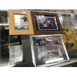 Three signed photographs, all framed and glazed,