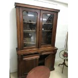 A Victorian mahogany glaze fronted bookcase