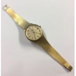 An 18ct Omega Deville automatic date display wristwatch on 18ct gold strap