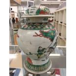 A 19th century Chinese famille verte vase CONDITION REPORT: Structurally sound.