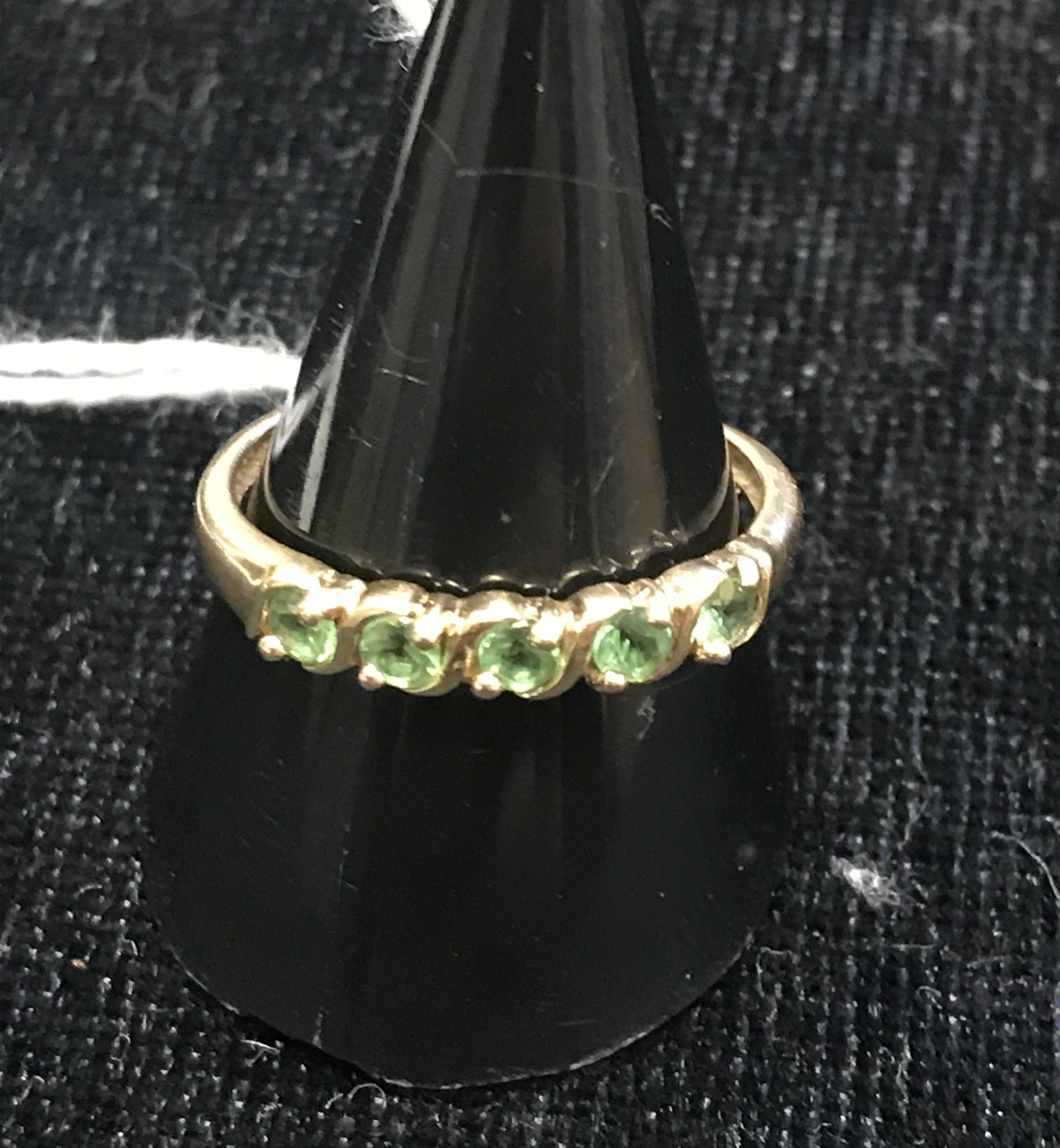 A 10k peridot dress ring