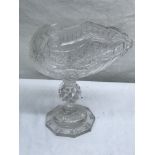 A 19th century crystal nautilus sweet meat dish with faceted knop and nonagon base,