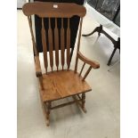 A pine rocking chair