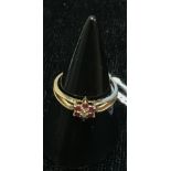 A 14k ruby and diamond dress ring