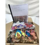 A box of Sindy and Barbie dolls;