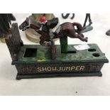 A cast-iron Showjumper money box